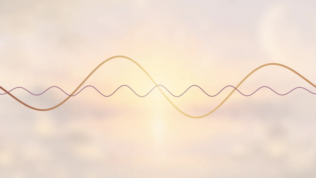 A large golden sound wave with a small plum wave beneath it